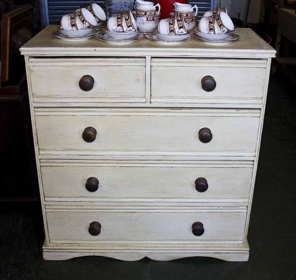 A painted pine chest of drawers, two over three