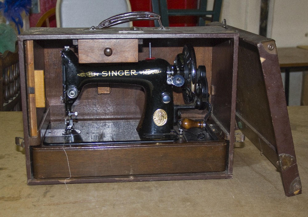 A Singer sewing machine in case