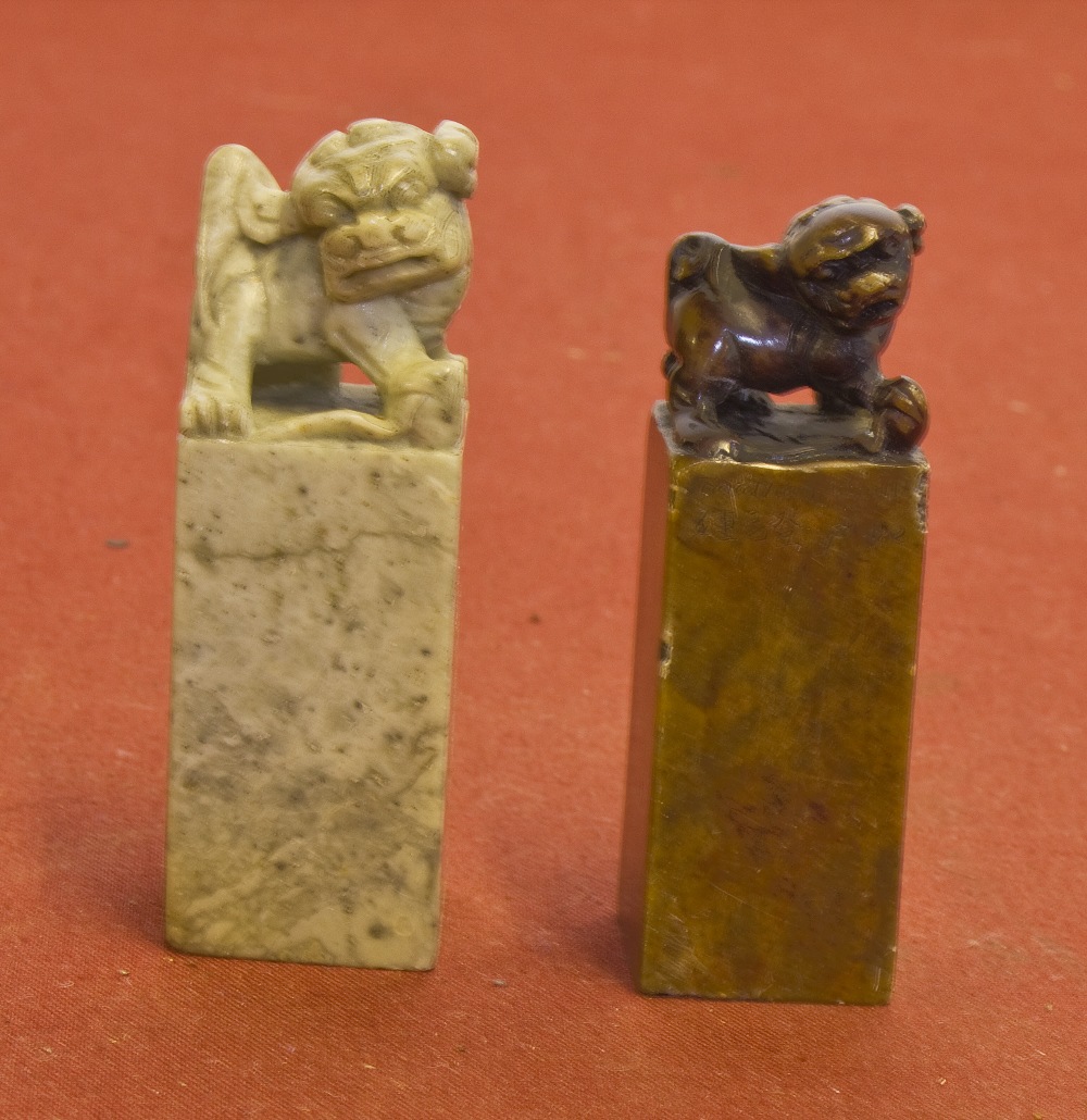 Two Chinese soapstone Dog of Fo seals, 8cm high and 7cm high