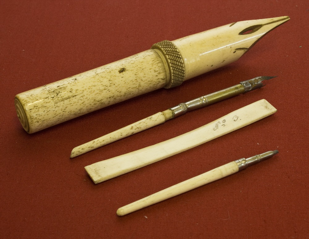 A bone pen holder containing 3 pieces