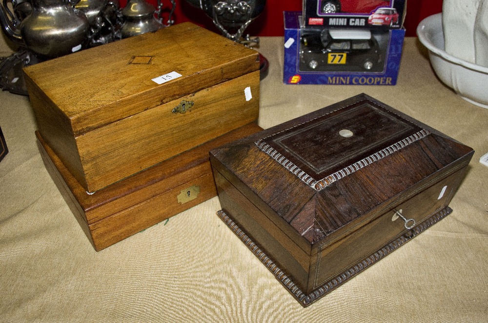 Two sewing boxes and one other