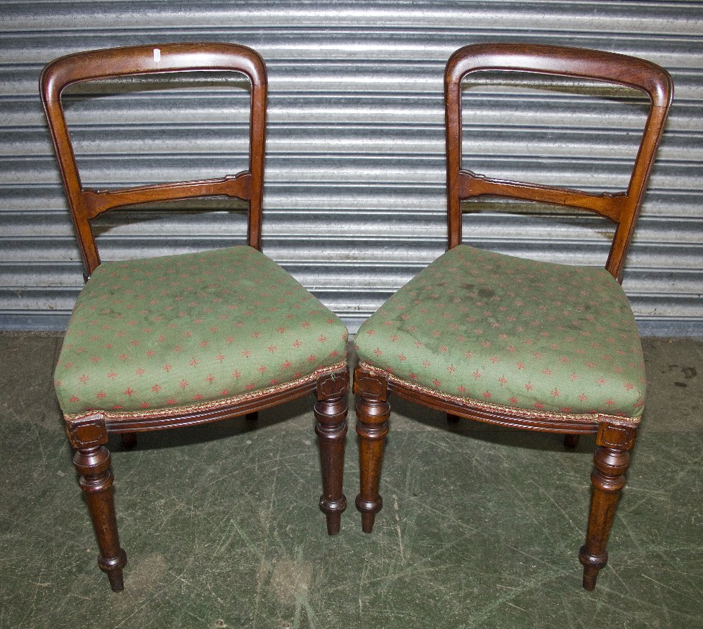 A pair of Victorian chairs.