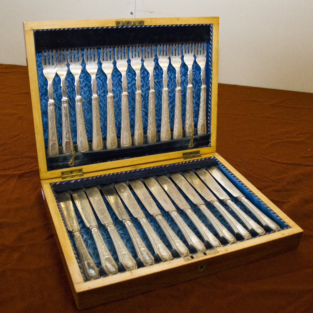 A canteen of fish knives and forks.