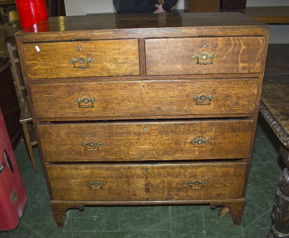 A late Georgian oak chest of drawers