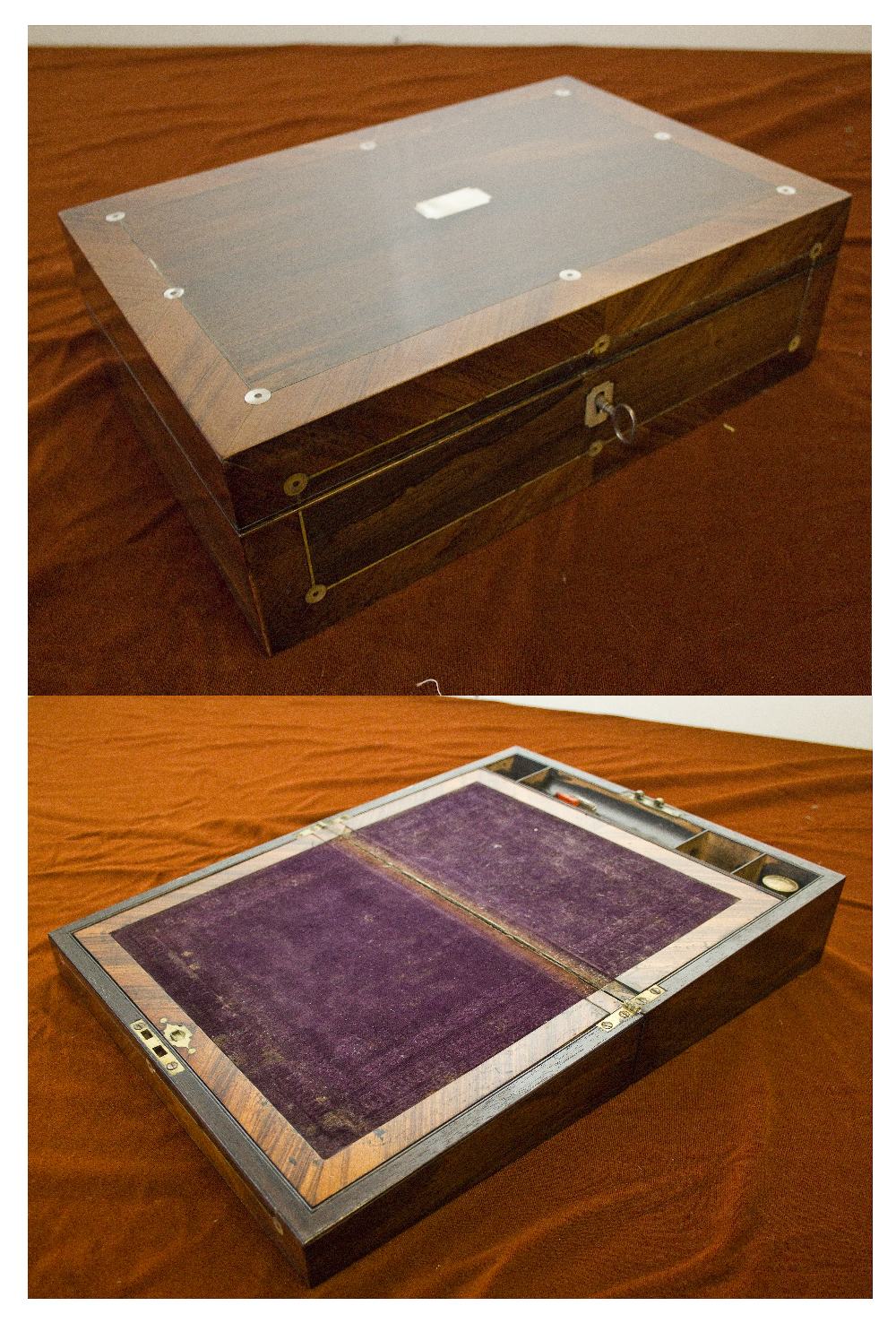 A Victorian inlaid writing box.