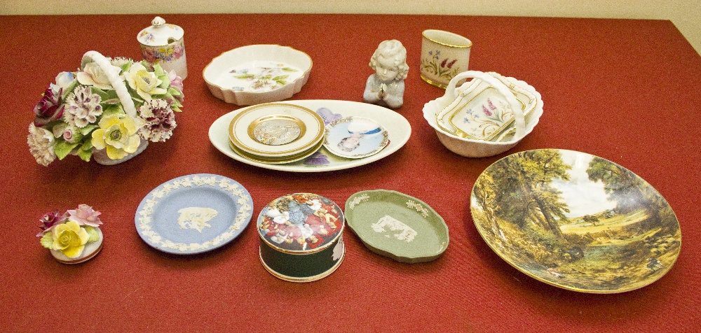 A collection of ceramics including a Bisque figure, Wedgwood, Doulton flowers, Chokin and other