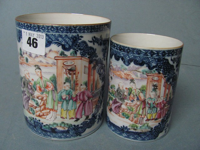 A large 18th century Chinese export porcelain mug, together with a small mug, restored.