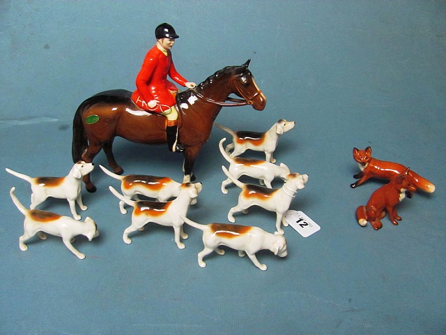 A Beswick fox hunting set comprising eleven pieces.