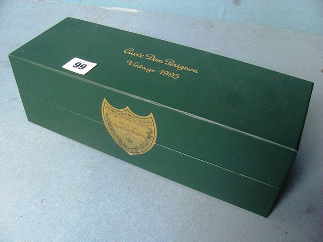 A boxed bottle of Don Perignon 1995.