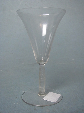 A Lalique wine glass with moulded leaf motif to the stem, engraved R Lalique, France to the base.