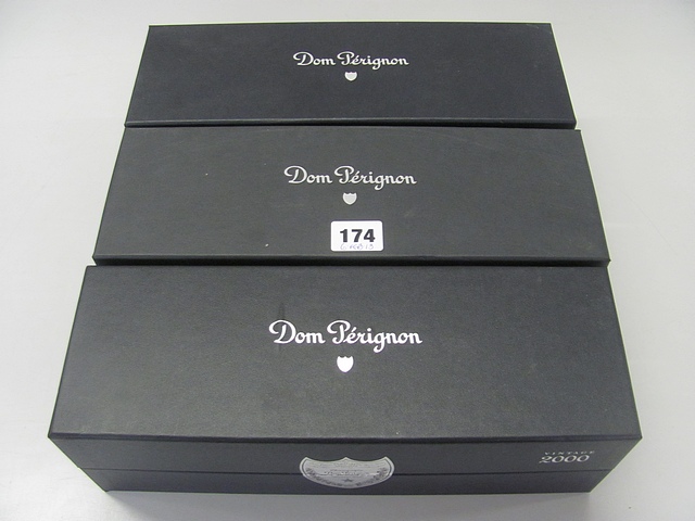 Three Moet and Chandon Dom Perignon vintage Champagne bottles in sealed boxes (one 2000 seal to