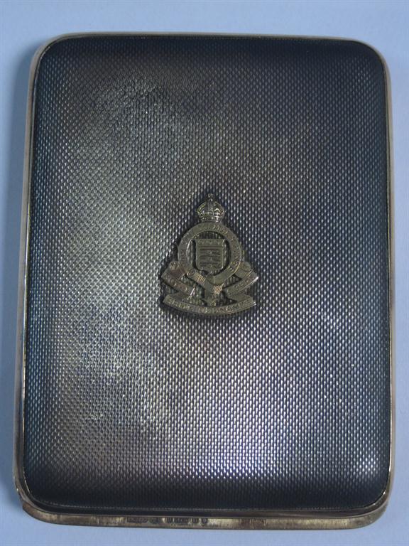 A George VI 9ct gold and silver Asprey`s patent Cigarette Case with RAOC crest and interior