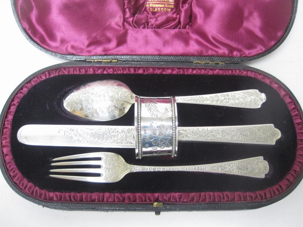 A Victorian four piece Christening Set with floral and leafage engraving, in case