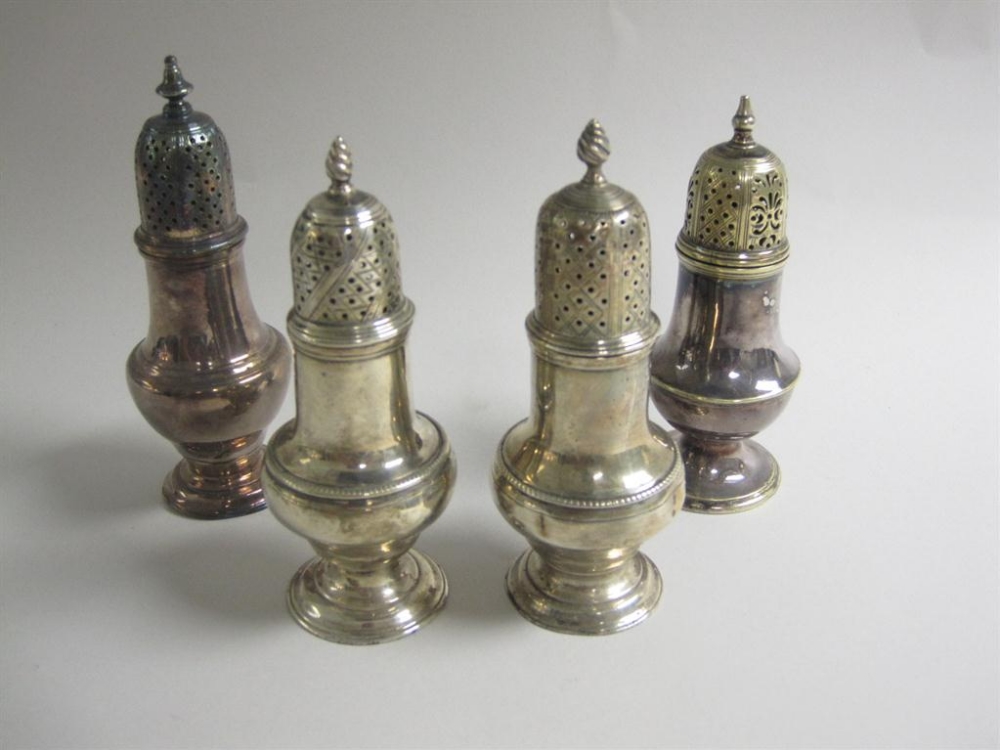 Two Georgian silver Pepper Pots and two plated of similar design