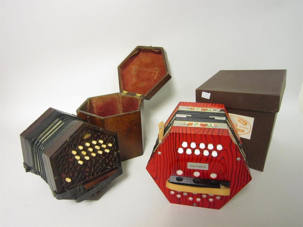 A Lachenal anglo system Concertina labelled Thomas Dawkins, 16 buttons to each end with rosewood