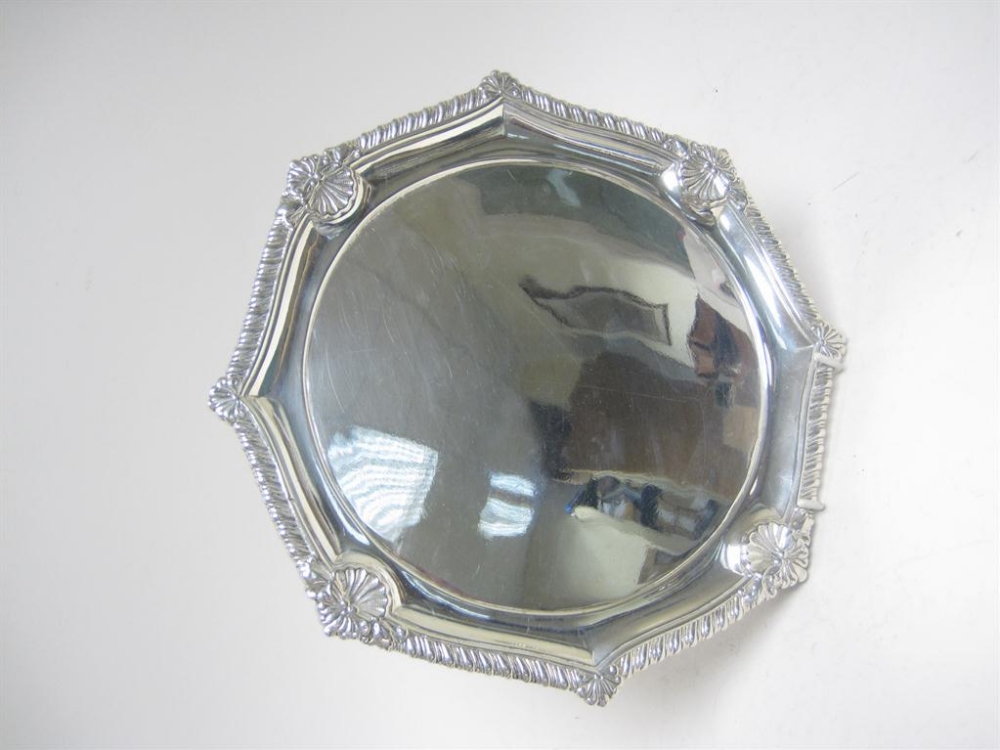 A George III shaped octagonal Salver with scallop corners and shaped bracket feet, London 1808, 10in