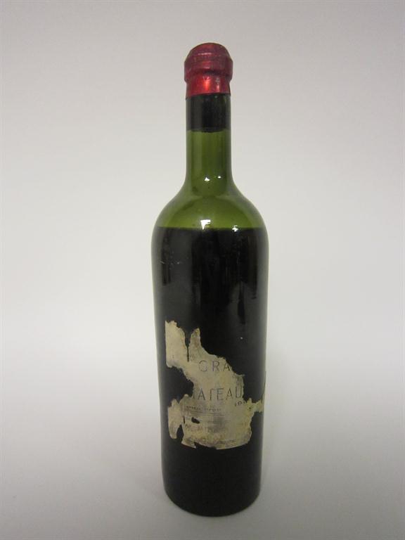 A bottle of 1917 Chateau Latour (ls, over half of label missing).