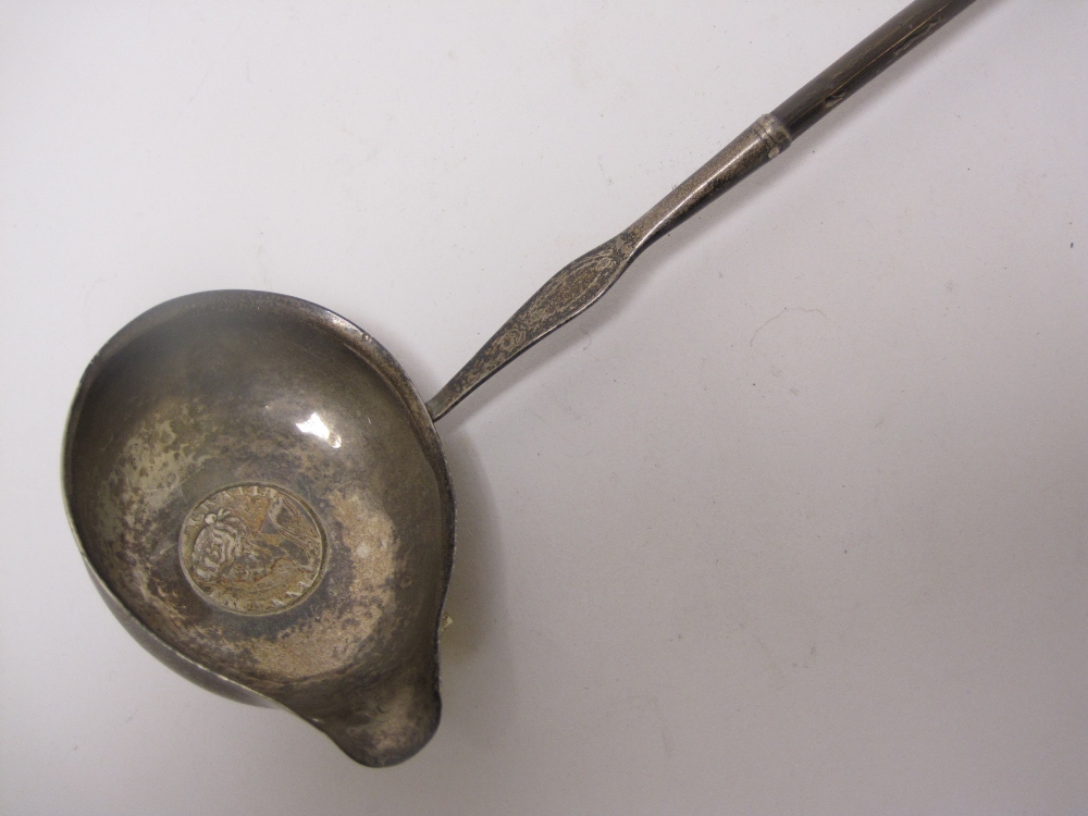 A George III Toddy Ladle with coin inset bowl and spiral whalebone handle, London 1793