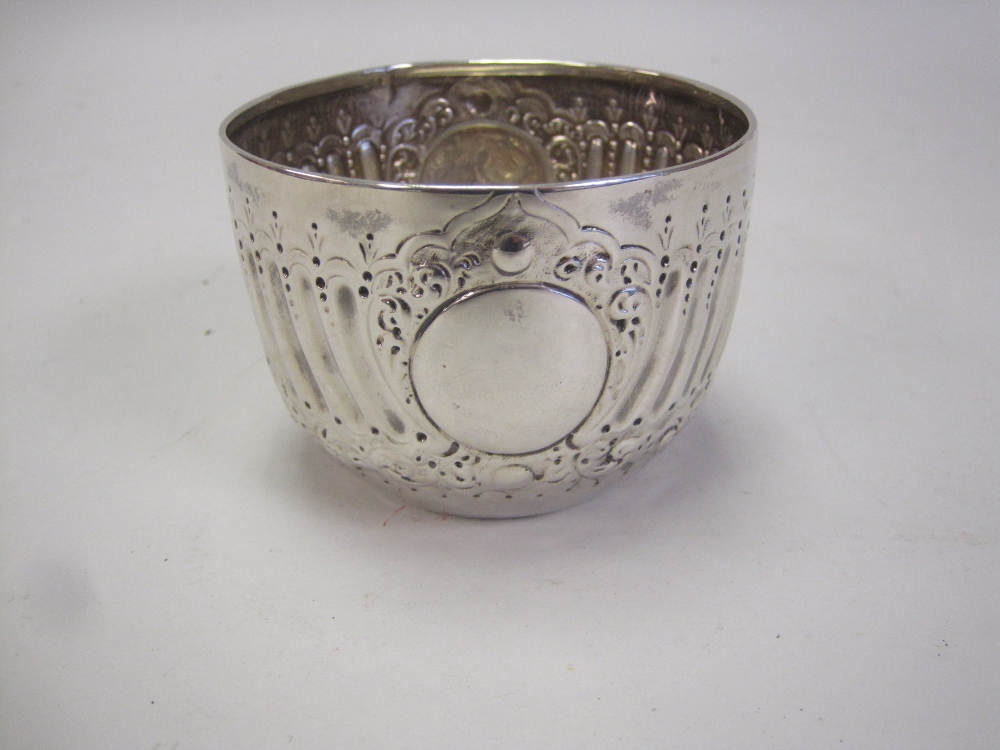 A Victorian Sugar Bowl with gadroon and scroll embossing, vacant cartouche, London 1886