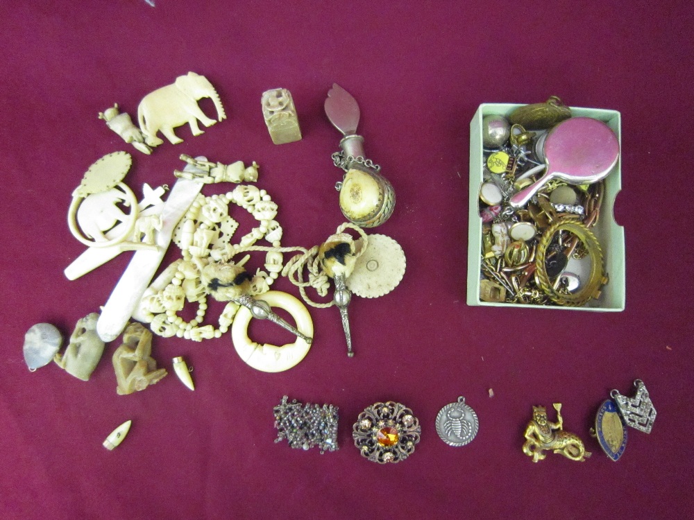 A quantity of Badges and ivory, bone and mother of pearl items including animals, etc