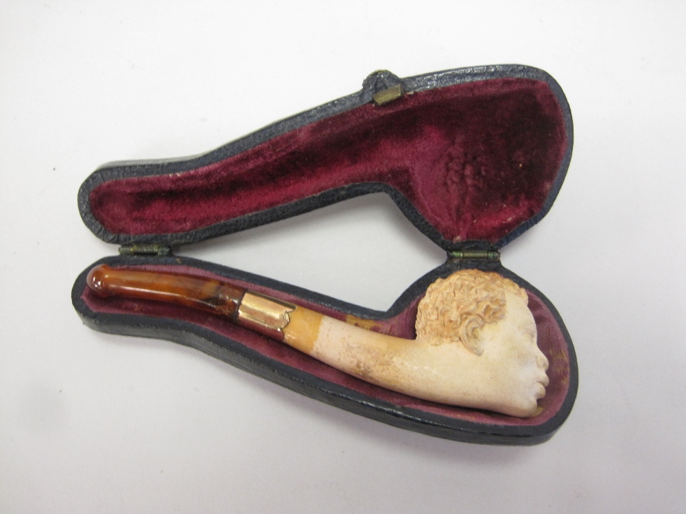 A small Meerschaum Pipe carved negro head, in case