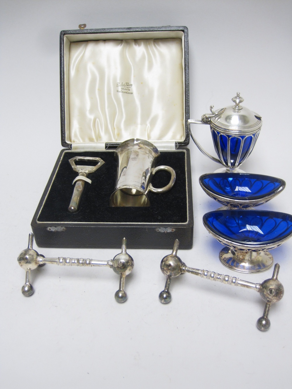 A 19th Century Sheffield plate wirework three piece Condiment Set with blue glass liners, double