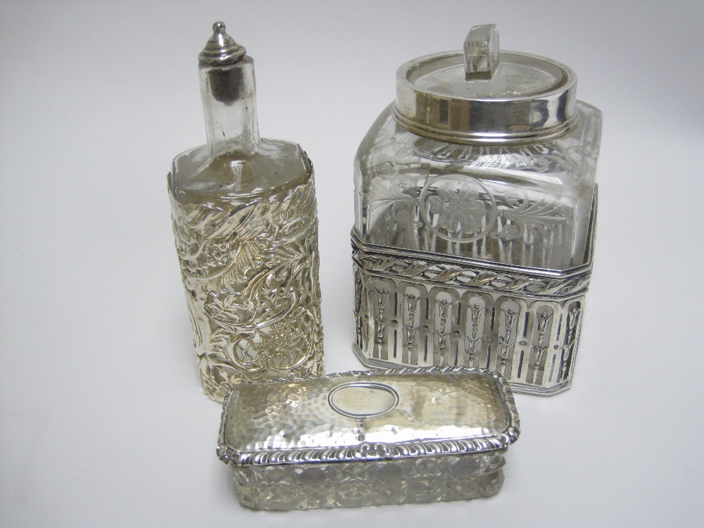 A Continental silver cased square cut glass Scent Jar, stopper A/F, an Edward VII silver cased Scent