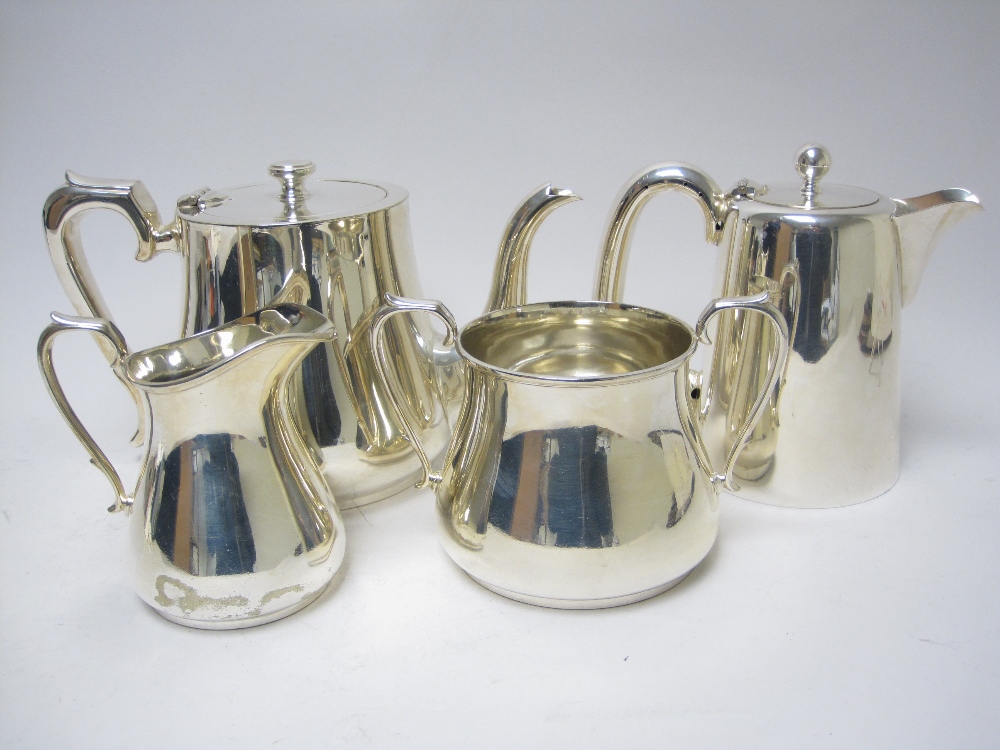 A plated three piece circular Tea Service of bellied form and a similar Hot Water Jug