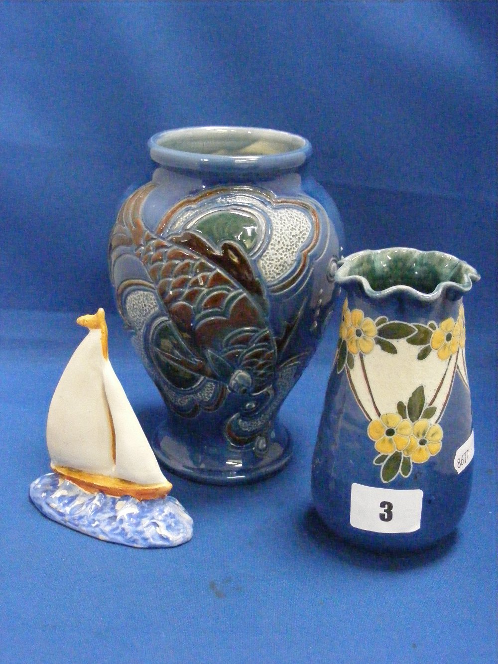 A Brannan Limited Barnstaple Studio vase, depicting carp on a blue ground, plus a Brannan Studio