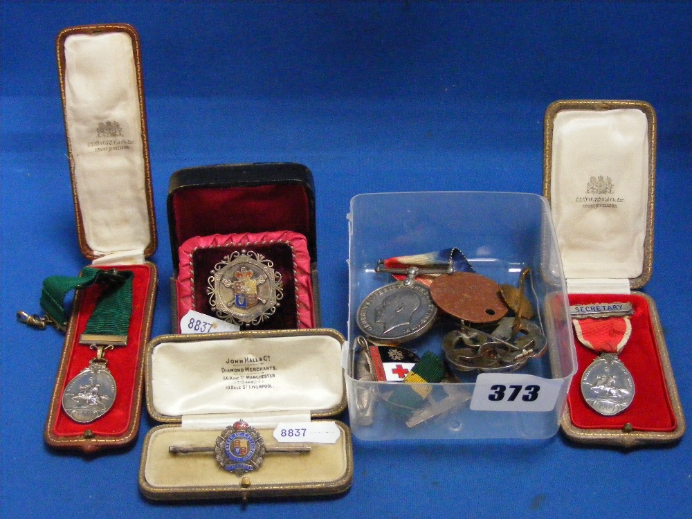 A collection of interesting items, to include two silver medals related to the International Horse