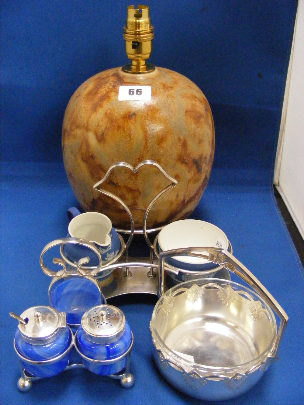 A Royal Doulton lamp base with mottled brown appearance and of ovoid form, together with a blue