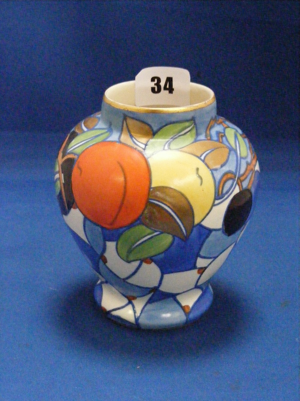 A highly decorative Bursley ware vase designed by Charlotte Rhead of baluster form with abstract