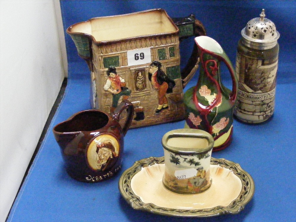 A collection of Royal Doulton items, to include a jug depicting Charles Dickens characters