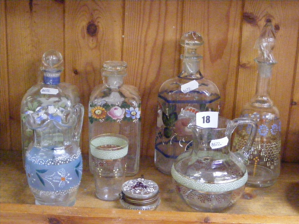 A collection of late Victorian and later clear glass items with hand painted decoration,