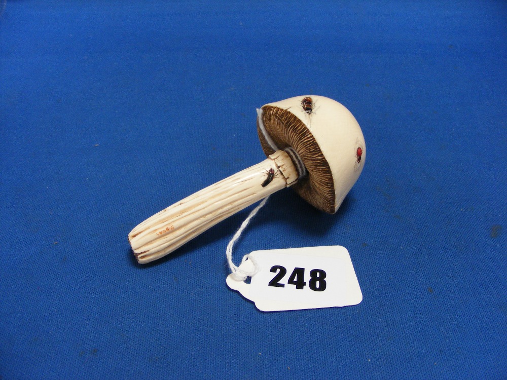 A Japanese ivory carved Shibayama toadstool finely inlaid with insects, signed to stalk, 9½cms long.