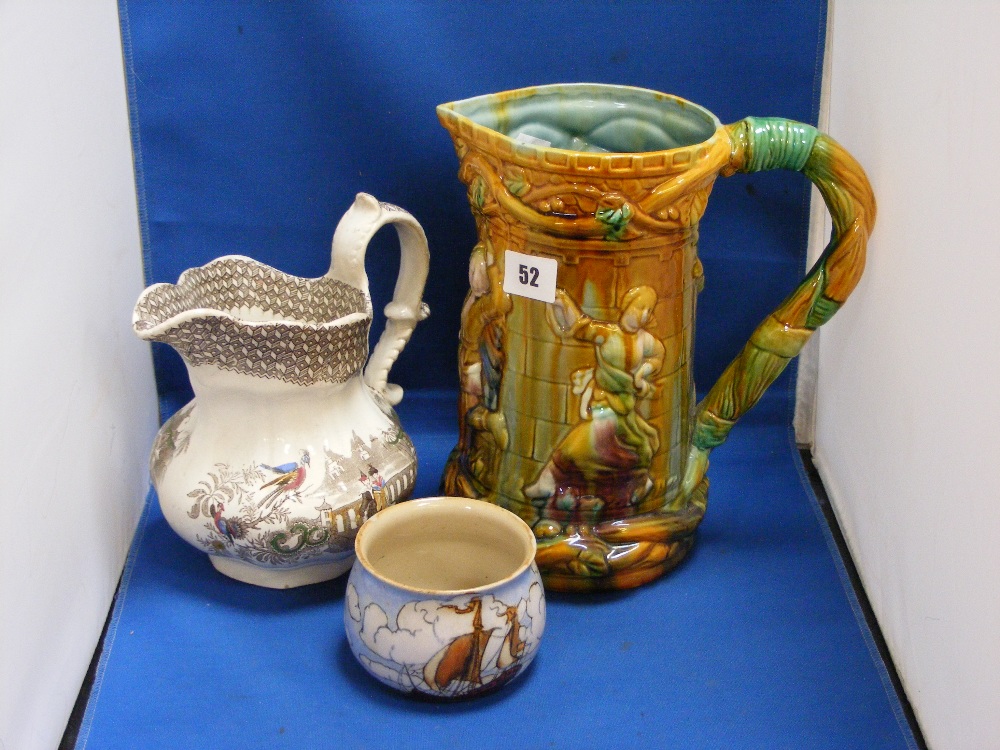 An antique Majolica jug in predominantly greens and browns, together with a Royal Doulton bowl