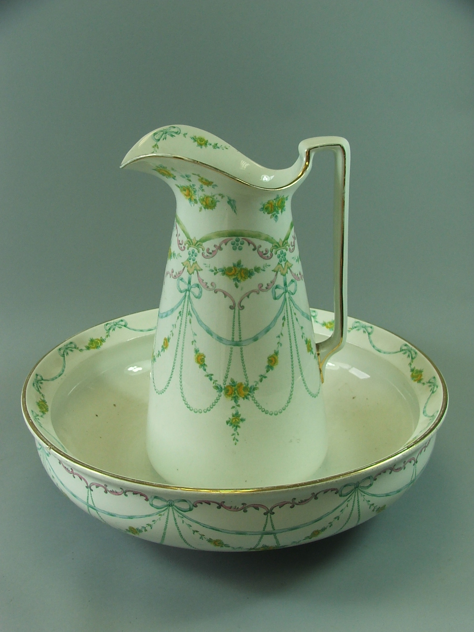 A John Maddock & Sons Jug and Bowl Set with Ribbon and Swag Decoration (Jug Chip to Pourer)