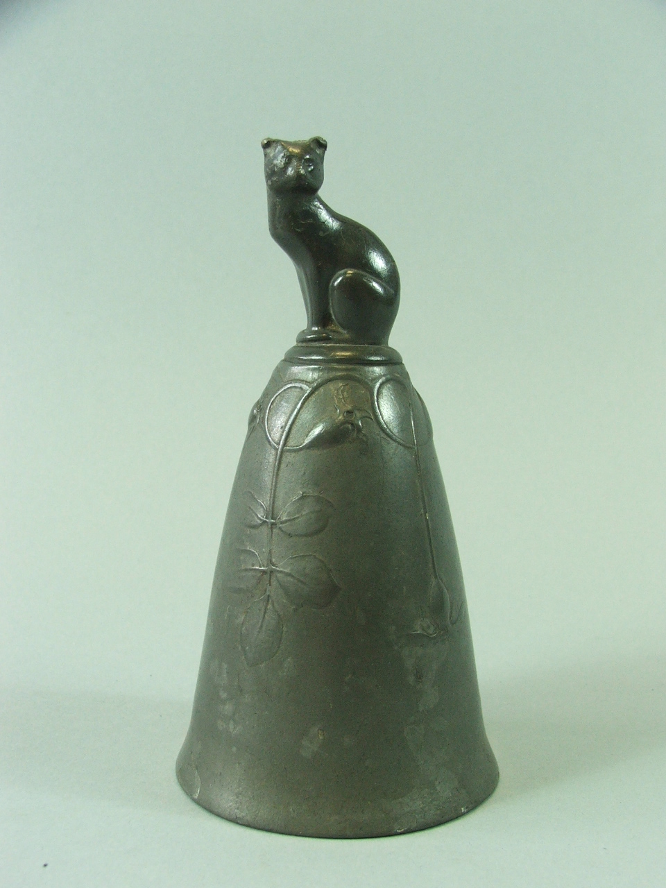 An Art Nouveau Pewter Kayserzinn Desk Bell No 4610 with Seated Cat Handle, 14 cm High.