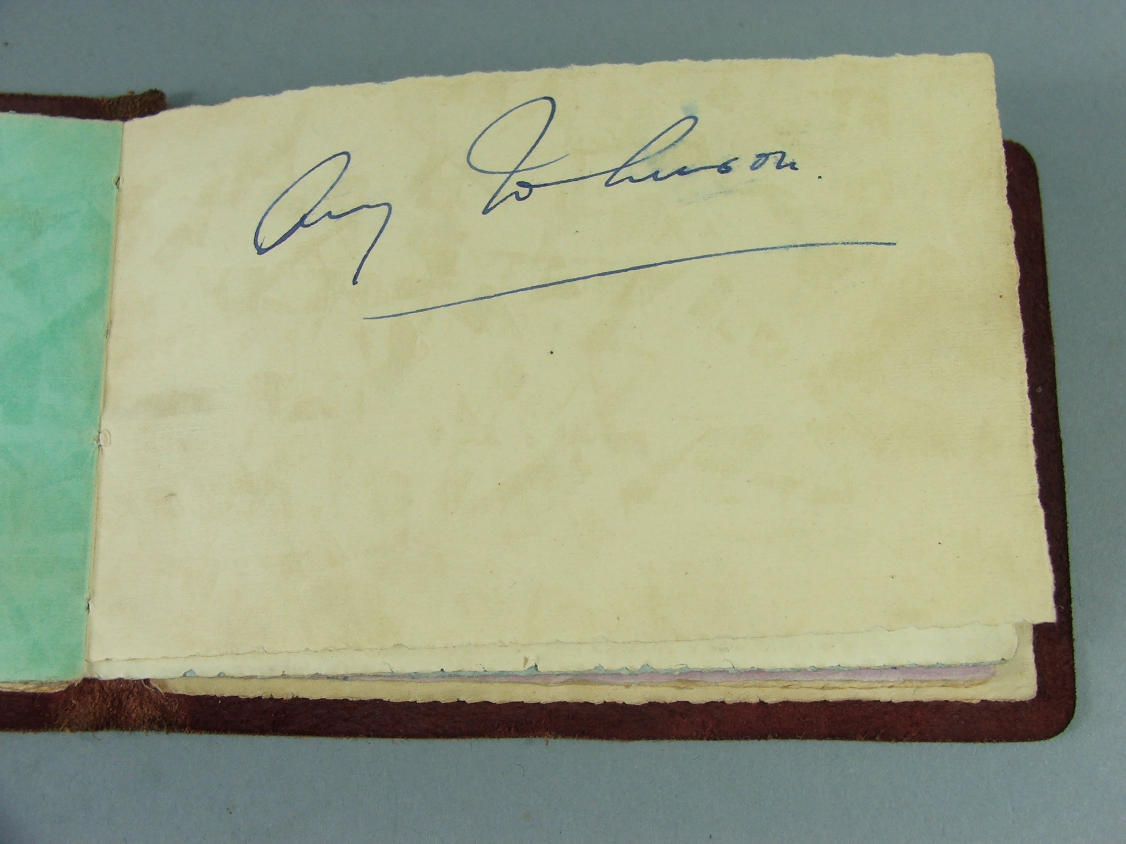 An Edwardian Autograph Album Circa 1936 with Various Rhymes and Sketches and one Page Signed 'Amy