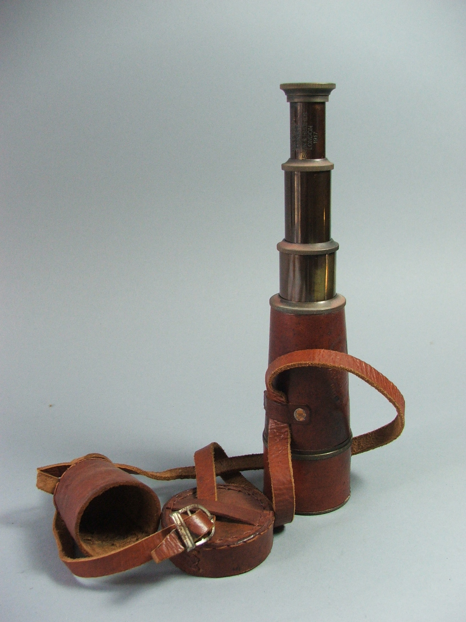 A WWI Leather Cased Brass Three Drawer Telescope by Kelvin Hughes Signed London 1917, 16 cm Long (