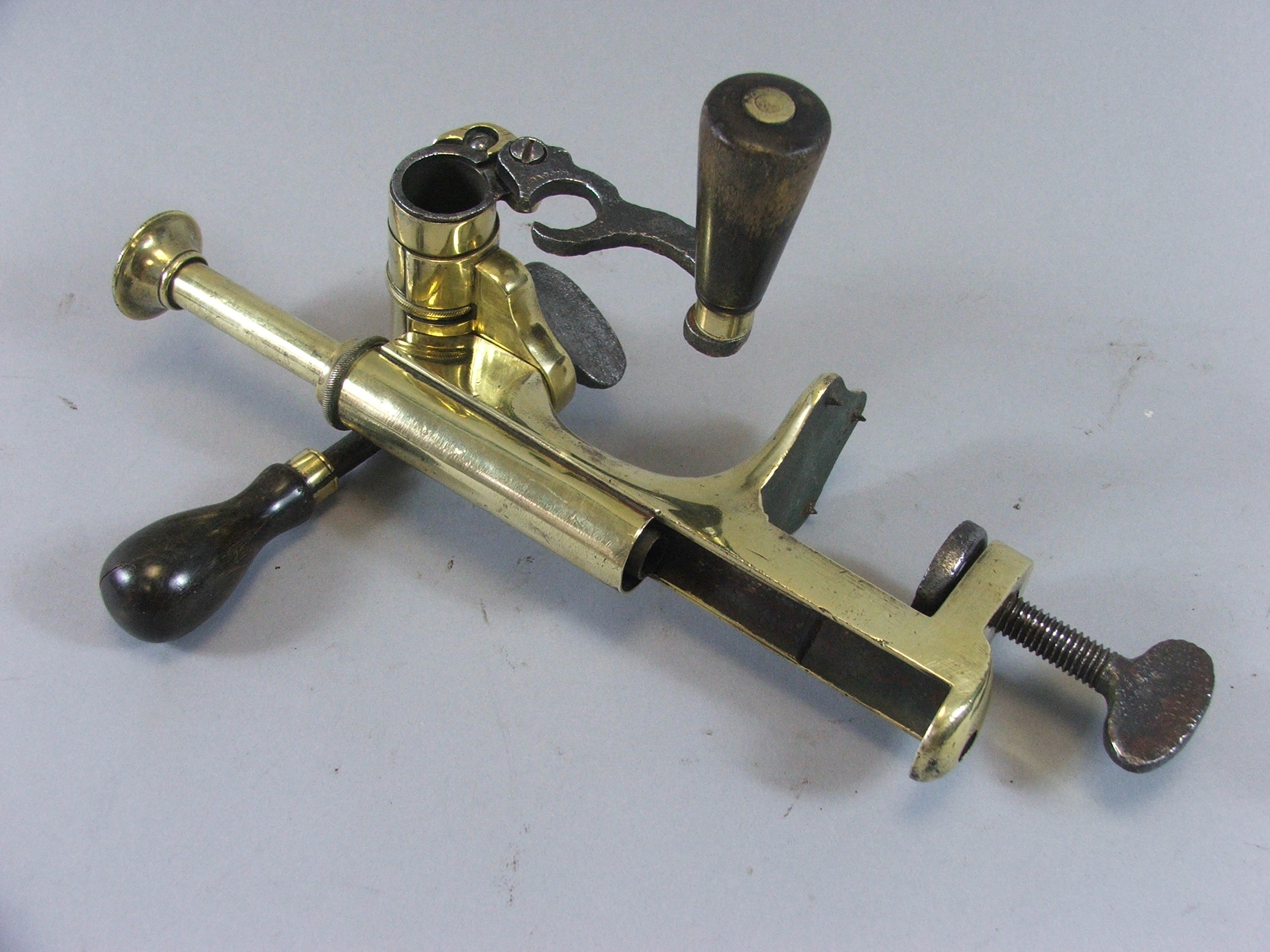 A 19th Century Brass and Iron Cartridge Maker by G & J What.