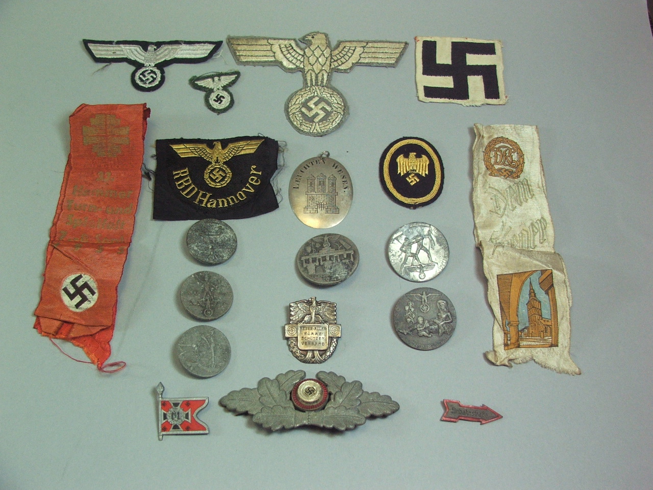 A Collection of Nazi Cloth and Metal Badges.