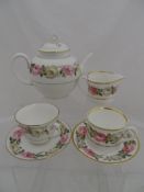 Part Royal Worcester `Royal Garden` Pattern comprising tea pot, four tea cups, four saucers, four