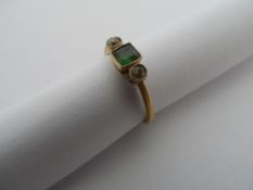 Lady`s 18 ct gold diamond and square cut emerald ring, 2 gms, size L.