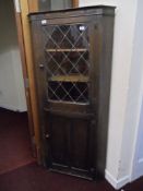 Edwardian Cottage Corner Cabinet with leaded glass front, two shelves and a cupboard beneath, approx