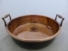 Circa 19th Century Copper Preserving Pan together with a round copper dish on claw feet.