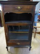 Edwardian Music Cabinet, the cabinet features two drawers to the top and bottom and a central