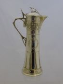 Art Nouveau Style Claret Jug, the silver metal claret jug features foliate design and hinged lid