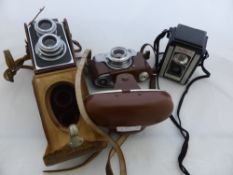 Miscellaneous collection of vintage cameras including Ricohflex Model III, Kodak Duaflex II