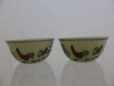 Pair of Chinese Tea Bowls, the fine bowls depicting a family of chickens including a rooster amongst